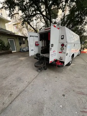 Magnet Plumbing service vehicle on-site for Water Heater Repair in Westwood
